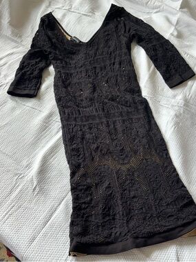 Bebe BodyCon sheer Lace Dress
Black with lining
XS